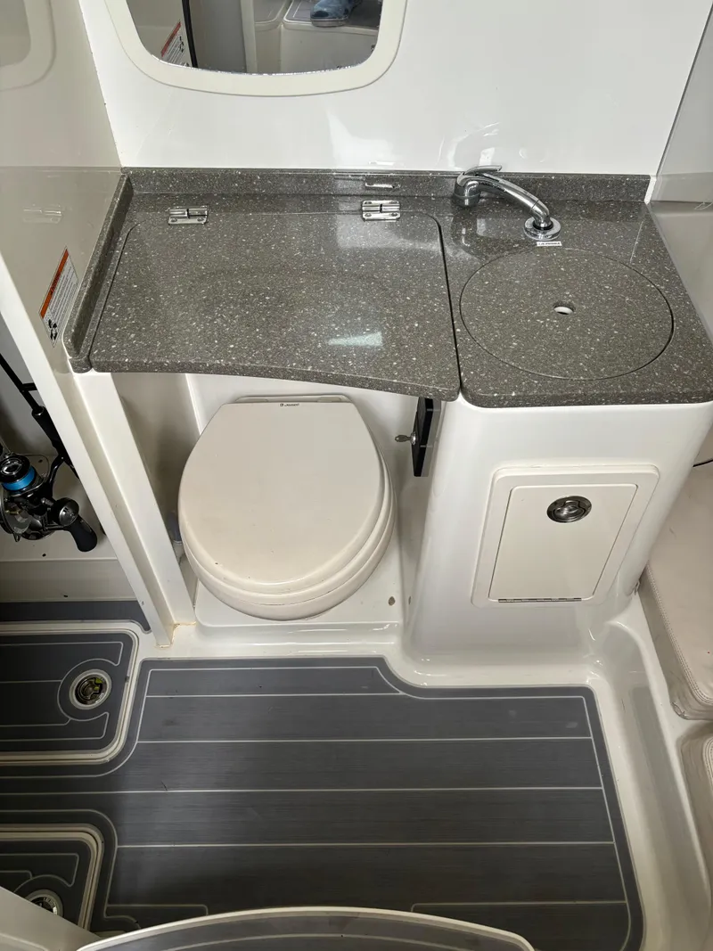 Slide: The Image of 2017 HCB Speciale boat bathroom with toilet and compact sink. - 48
