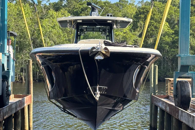 Slide: The Image of Luxurious seating on a 2017 HCB Speciale boat, featuring sleek, cushioned design. - 5