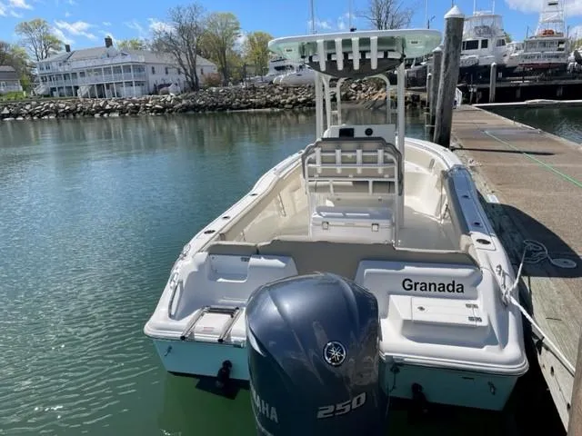 Slide: The Image of 2023 Key West 239 FS boat docked with Yamaha 250 engine. - 2