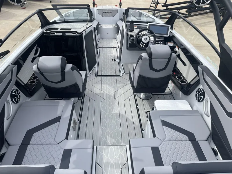 Slide: The Image of 2024 Yamaha Boats 222XD interior with modern seating and sleek dashboard design. - 6