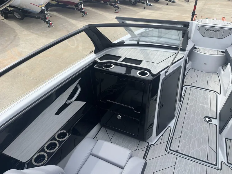 Slide: The Image of 2024 Yamaha Boats 222XD interior with sleek seating and modern design. - 8