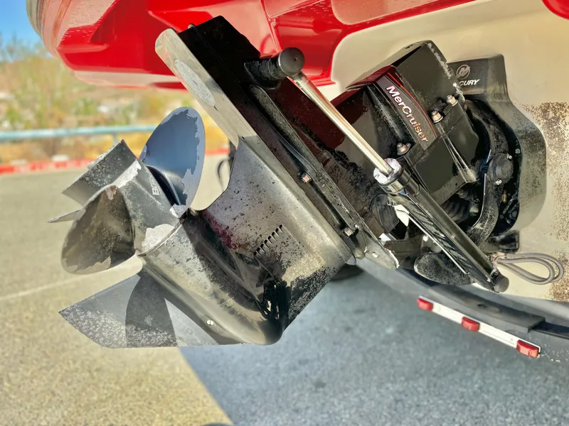 Slide: The Image of Close-up of 2021 Bayliner VR5 Bowrider I/O boat propeller and outdrive. - 6