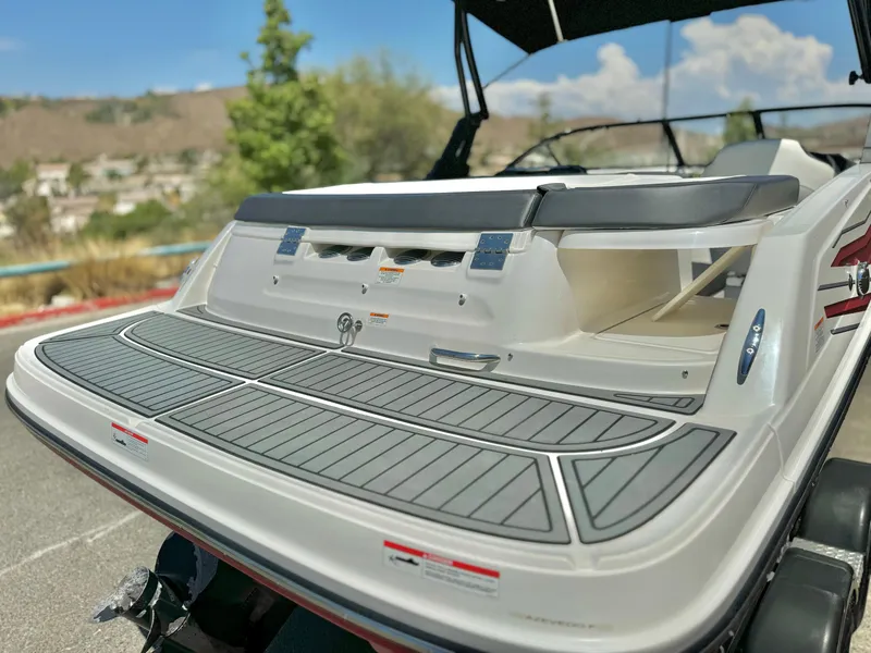 Slide: The Image of 2021 Bayliner VR5 Bowrider I/O with spacious swim platform and sleek design. - 7