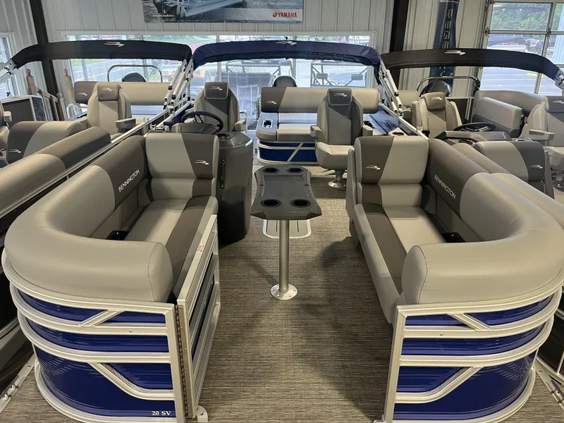 Slide: The Image of 2024 Bennington 20 SVSB-SPS pontoon boat with spacious seating and modern design. - 1