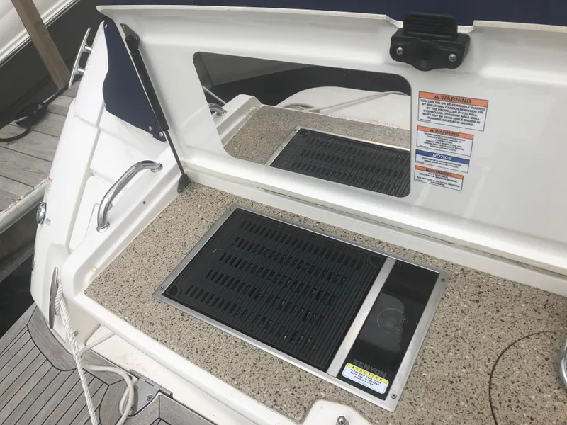 Slide: The Image of Outdoor grill on 2018 Sea Ray 350 Sundancer Coupe boat deck. - 26