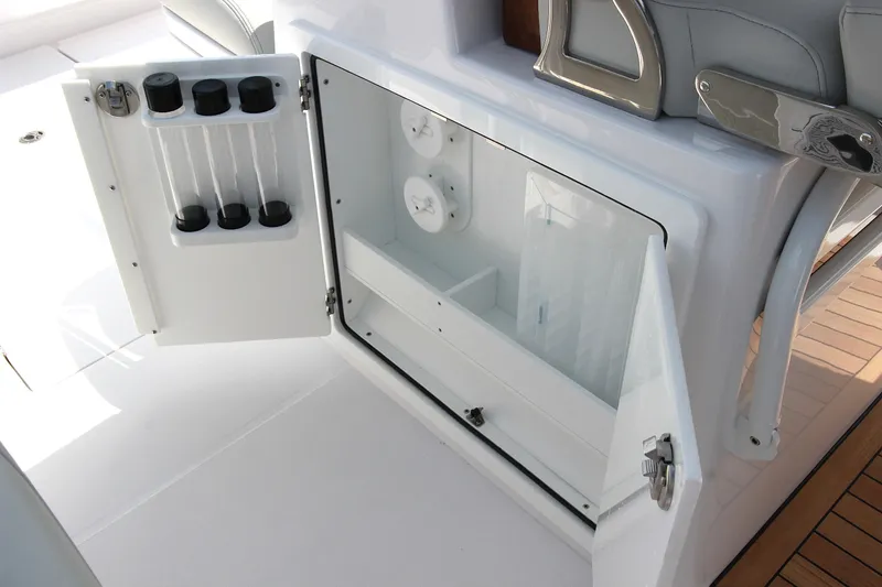 Slide: The Image of Open storage compartment on 2025 Jupiter 380LS boat, featuring sleek design and modern amenities. - 10