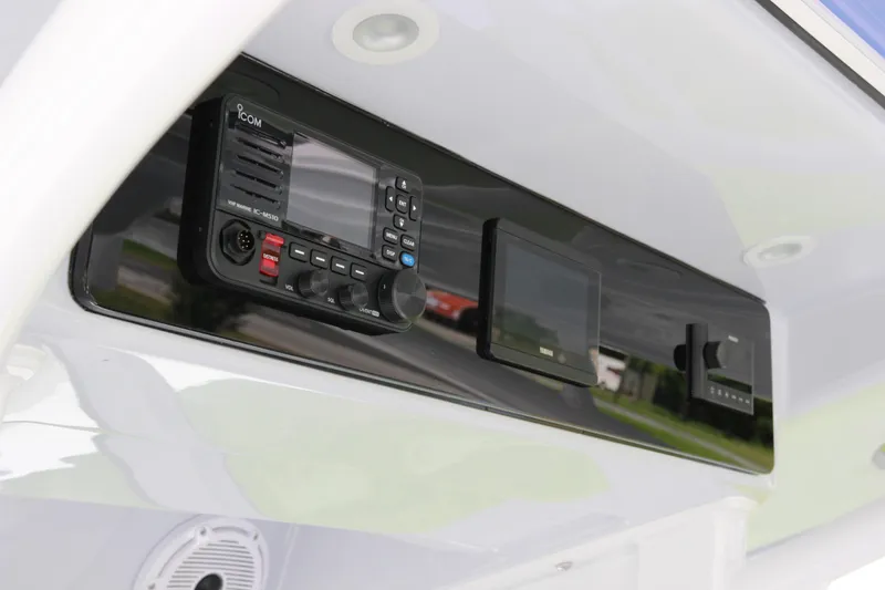 Slide: The Image of Control panel of 2025 Jupiter 380LS boat with electronic devices and speaker. - 15