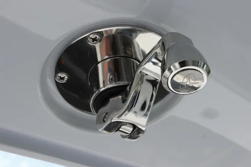 Slide: The Image of Chrome boat fitting on 2025 Jupiter 380LS, featuring sleek design and secure attachment. - 16