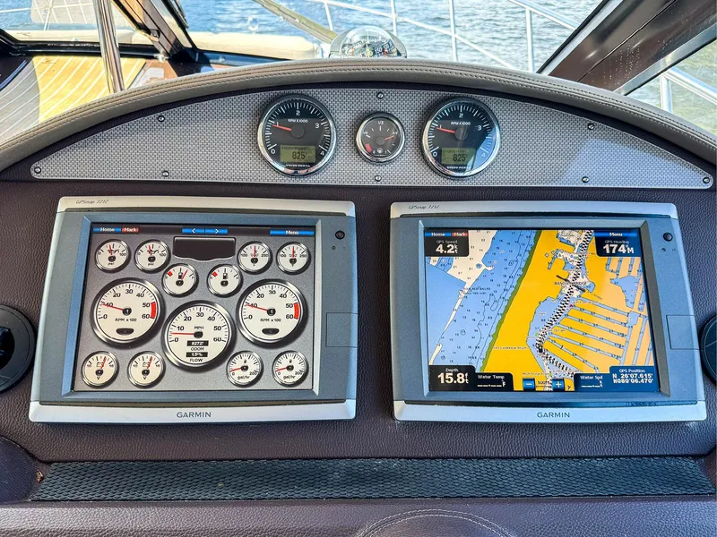 Slide: The Image of Dashboard of 2015 Regal 42 Sport Coupe with navigation and instrument displays. - 10