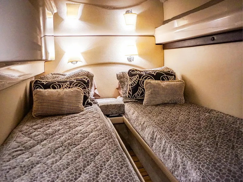 Slide: The Image of Cozy twin cabin in 2015 Regal 42 Sport Coupe yacht interior. - 18