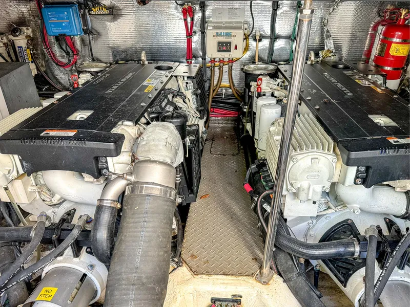 Slide: The Image of Engine room of 2015 Regal 42 Sport Coupe with dual engines and equipment. - 20
