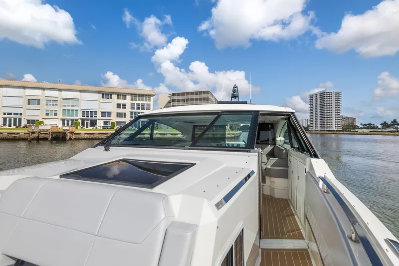 Slide: The Image of 2022 Formula 500 Super Sport Crossover yacht on a sunny waterfront. - 30