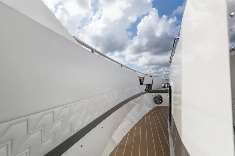 Slide: The Image of 2022 Formula 500 Super Sport Crossover yacht deck with cloudy sky background. - 31