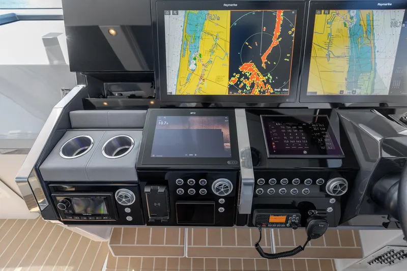 Slide: The Image of 2022 Formula 500 Super Sport Crossover dashboard with navigation screens and controls. - 38