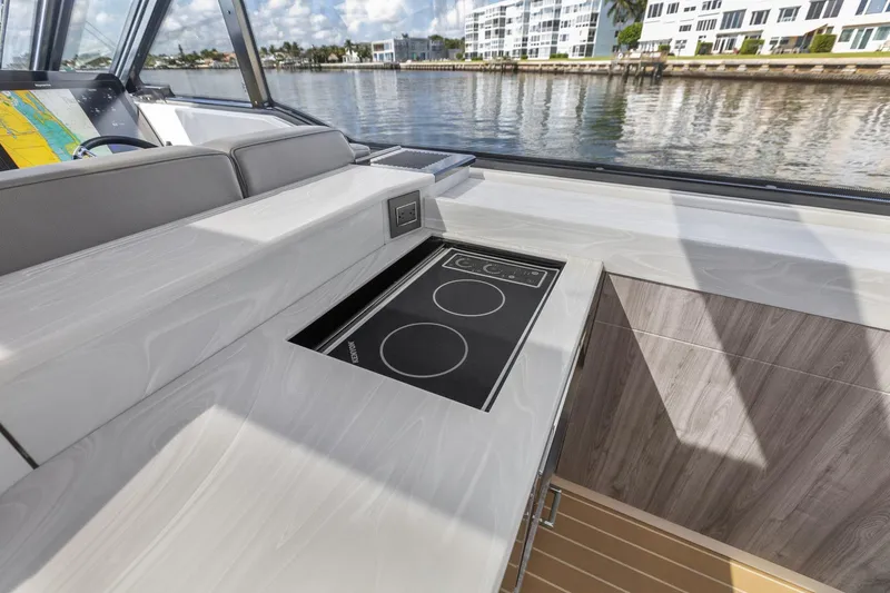 Slide: The Image of 2022 Formula 500 Super Sport Crossover yacht interior with sleek kitchen design. - 42