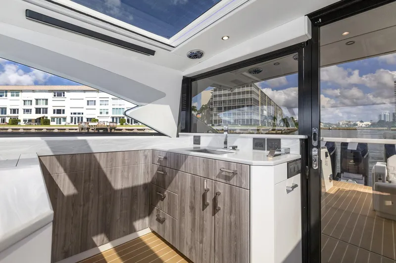 Slide: The Image of Luxurious interior of 2022 Formula 500 Super Sport Crossover yacht with modern cabinetry. - 43