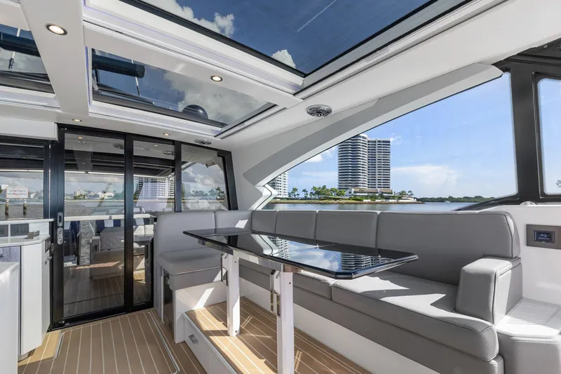Slide: The Image of Luxurious interior of 2022 Formula 500 Super Sport Crossover yacht with panoramic windows. - 47