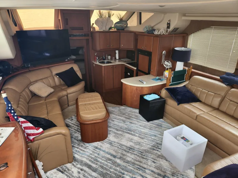 Slide: The Image of Luxurious interior of 2005 Silverton 43 Motor Yacht with leather seating and modern amenities. - 11