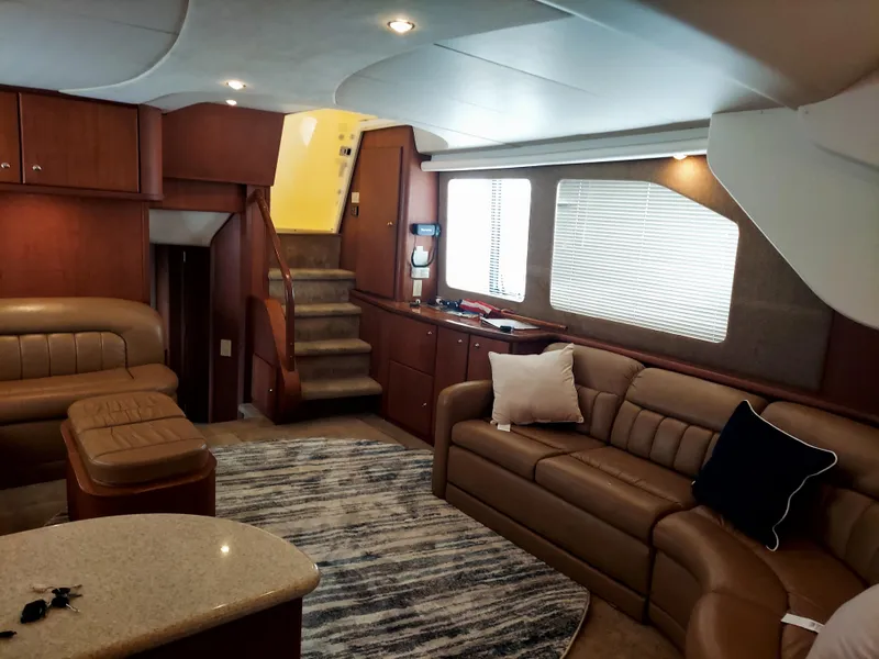 Slide: The Image of Luxurious interior of 2005 Silverton 43 Motor Yacht with leather seating and modern decor. - 14