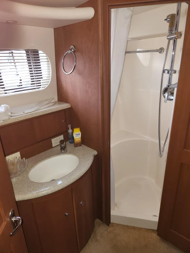 Slide: The Image of Bathroom interior of 2005 Silverton 43 Motor Yacht with shower and sink. - 20