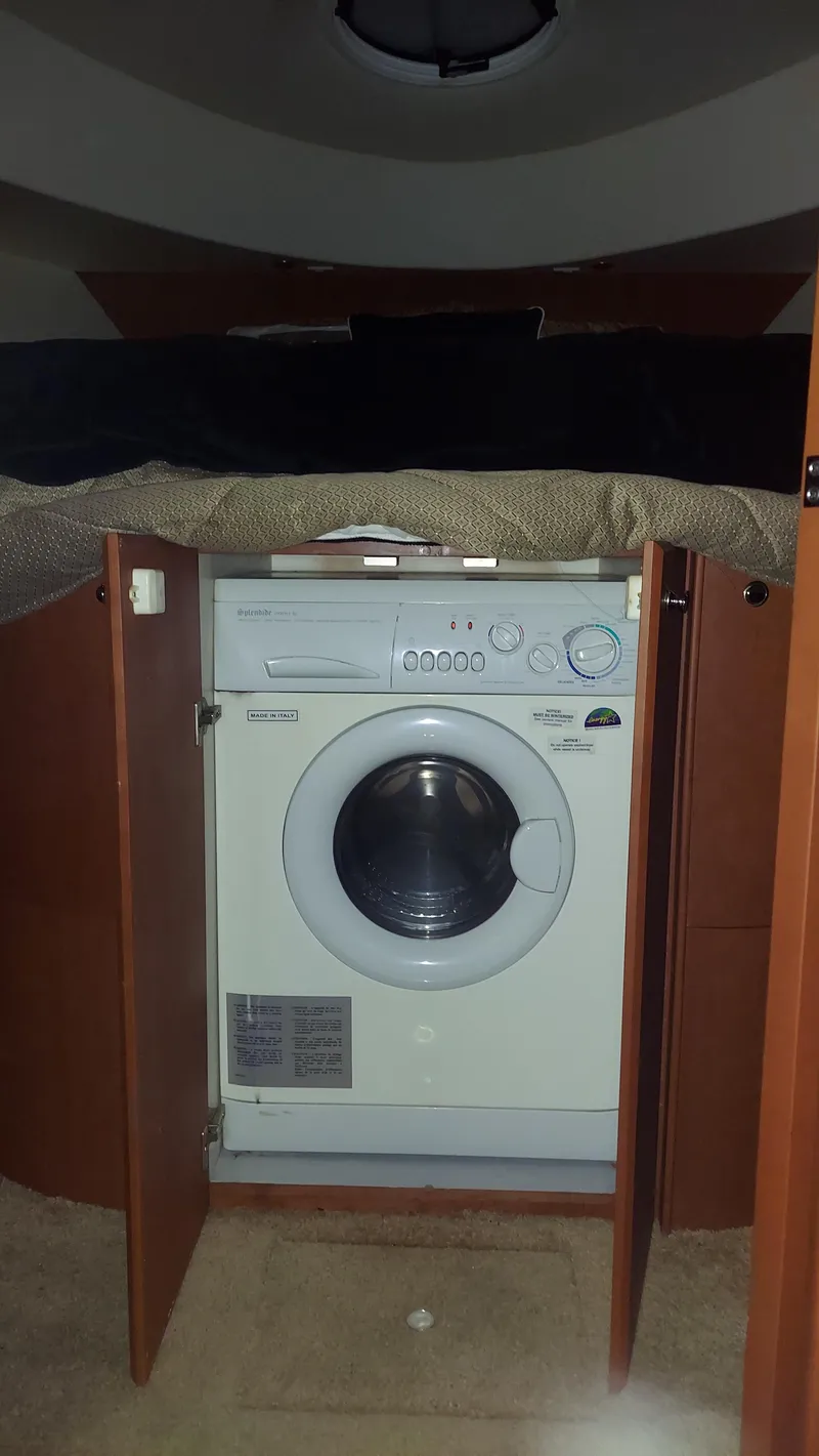 Slide: The Image of Washing machine inside 2005 Silverton 43 Motor Yacht cabin. - 21