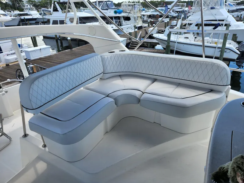 Slide: The Image of Luxurious seating on 2005 Silverton 43 Motor Yacht at marina. - 9