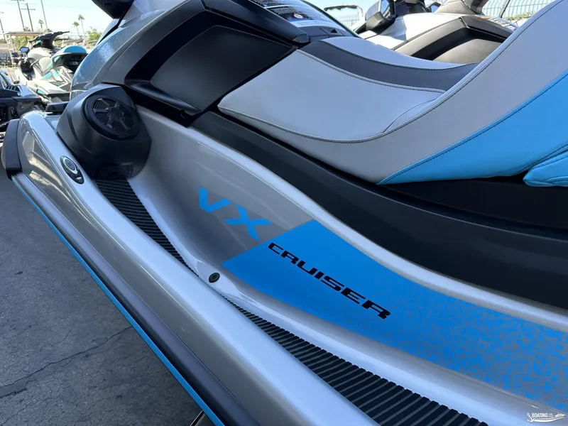 Slide: The Image of 2024 Yamaha WaveRunner VX Cruiser with Audio, sleek design, blue accents, outdoor display. - 7