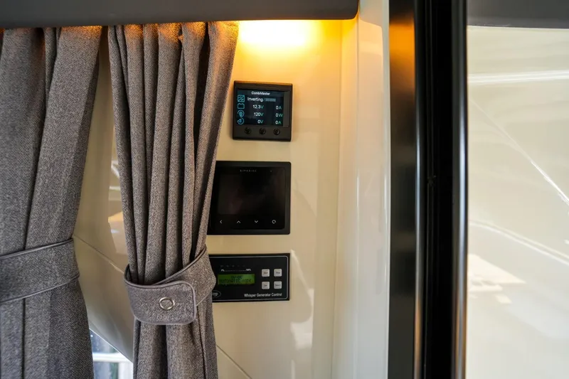 Slide: The Image of Control panel and curtain inside 2025 Marex 330 Scandinavia boat. - 22