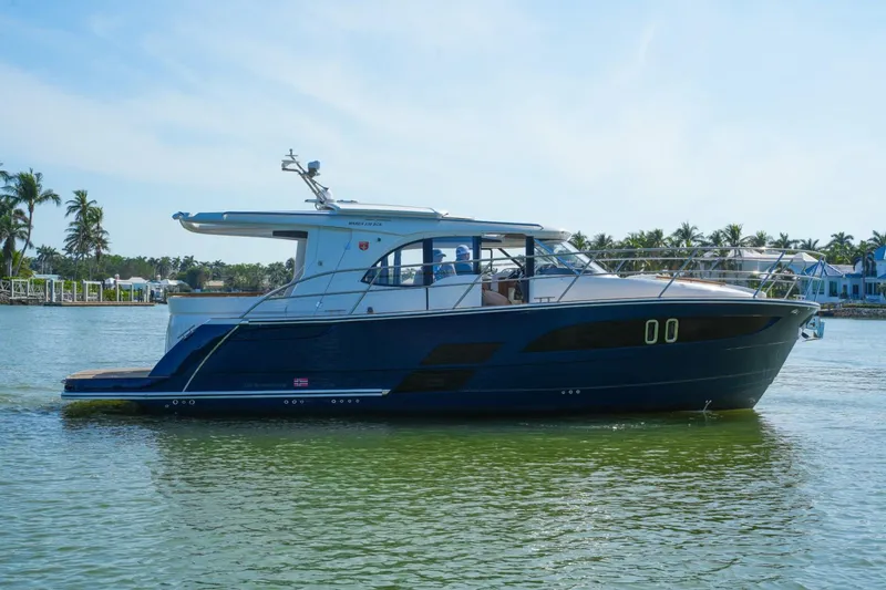 Slide: The Image of 2025 Marex 330 Scandinavia yacht cruising on a sunny day. - 8