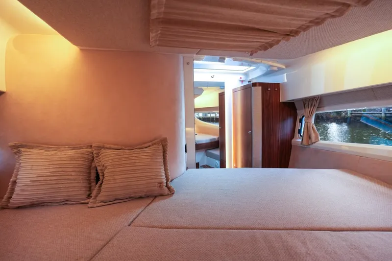 Slide: The Image of Luxurious interior of 2025 Marex 330 Scandinavia yacht cabin with cozy bedding. - 38
