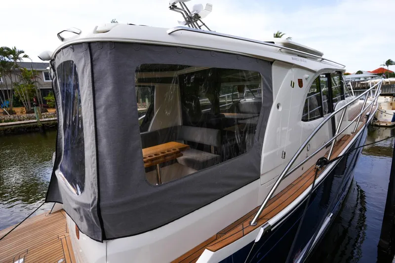 Slide: The Image of 2025 Marex 330 Scandinavia yacht docked, featuring sleek design and spacious interior. - 40