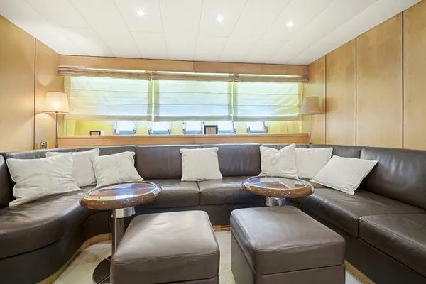 Slide: The Image of Luxurious interior of 2001 Mangusta 72 Open yacht with leather seating and modern decor. - 24