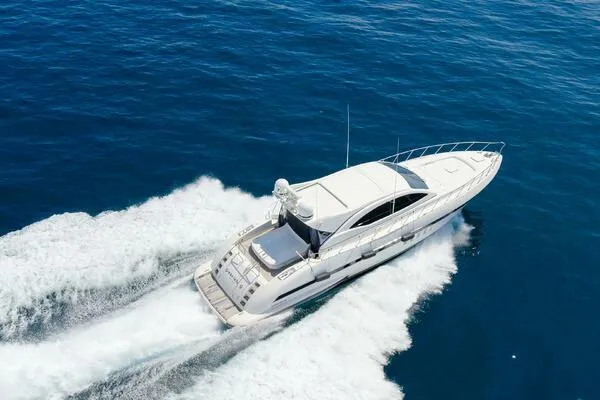 Slide: The Image of Mangusta 72 Open 2001 yacht cruising on open blue sea. - 43