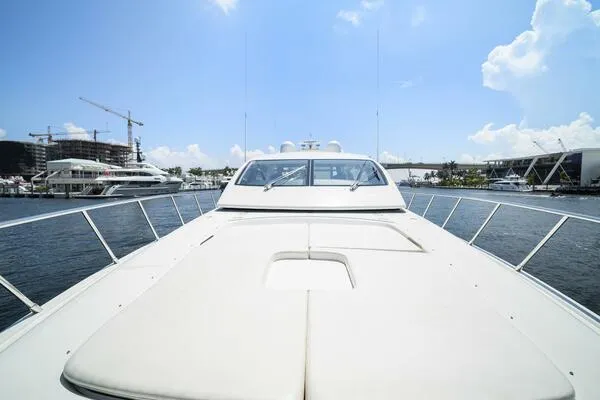 Slide: The Image of Mangusta 72 Open 2001 yacht on water, sunny day, marina background. - 6