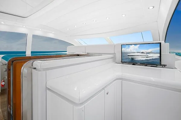 Slide: The Image of Luxurious interior of 2001 Mangusta 72 Open yacht with sleek design and ocean view. - 16