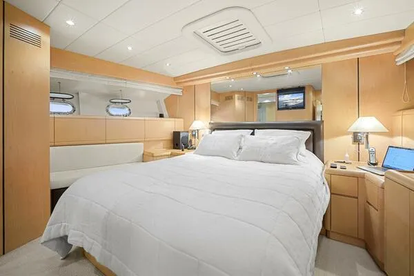 Slide: The Image of Luxurious bedroom interior of 2001 Mangusta 72 Open yacht with modern furnishings. - 27
