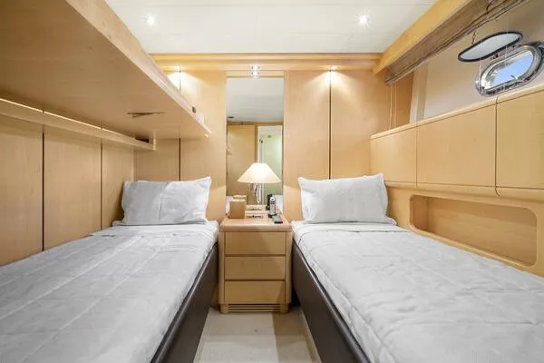 Slide: The Image of Luxurious twin cabin interior of 2001 Mangusta 72 Open yacht. - 29