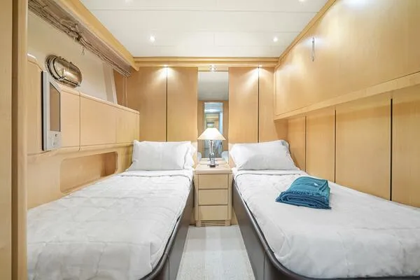 Slide: The Image of Luxurious twin cabin interior of 2001 Mangusta 72 Open yacht. - 30