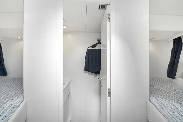 Slide: The Image of Interior of 2001 Mangusta 72 Open yacht with twin beds and modern design. - 38