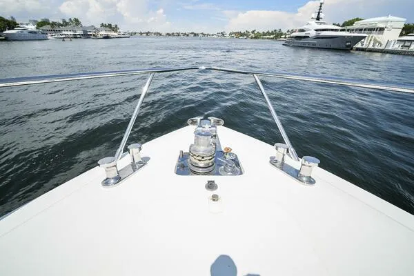 Slide: The Image of Bow view of 2001 Mangusta 72 Open yacht on a sunny day. - 4