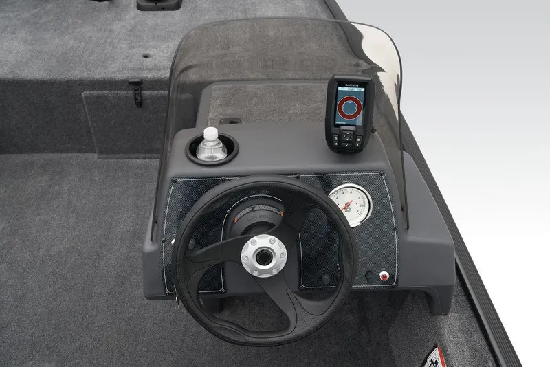 Slide: The Image of 2024 Tracker BASS TRACKER® Classic XL dashboard with steering wheel and navigation device. - 4