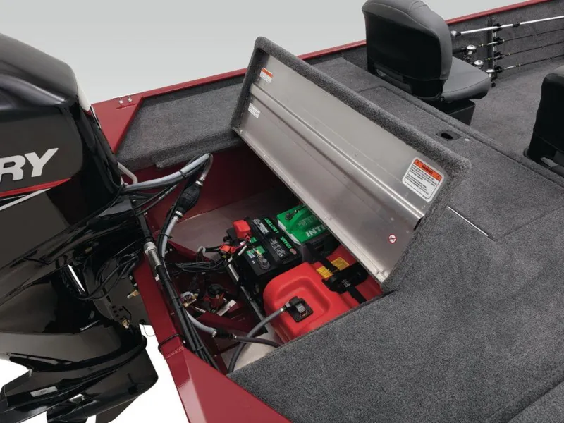 Slide: The Image of 2024 Tracker BASS TRACKER® Classic XL boat with open storage compartment and Mercury engine. - 6