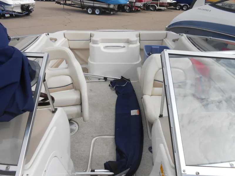 Slide: The Image of 2000 Chris-Craft 200 Bowrider SS interior with seating and open deck layout. - 2