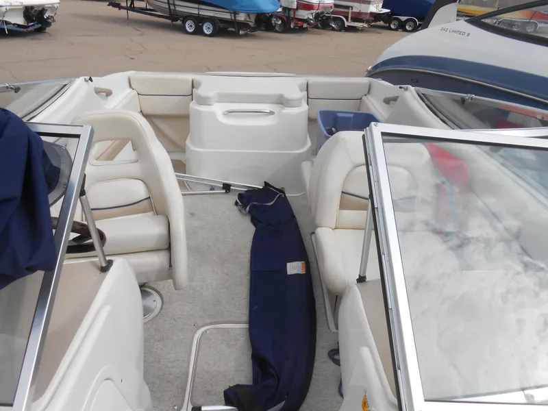 Slide: The Image of 2000 Chris-Craft 200 Bowrider SS interior with seating and open deck layout. - 3
