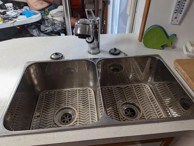 Slide: The Image of Stainless steel double sink with modern faucet on a Manta 42 yacht, 2000 model. - 43