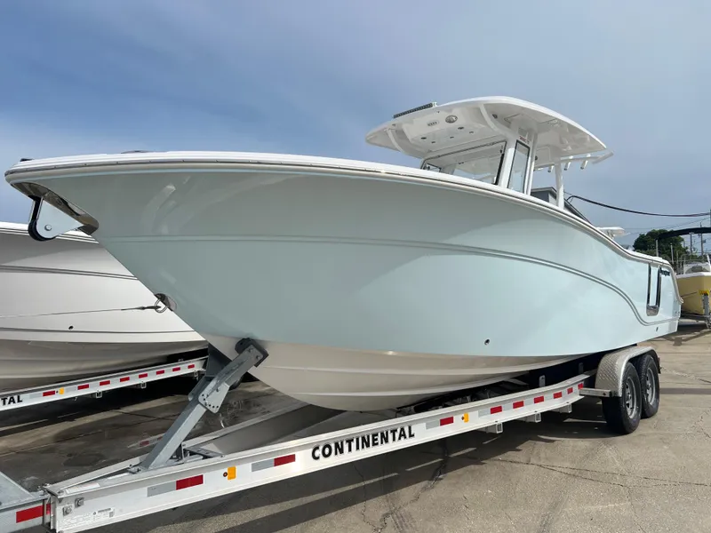 Slide: The Image of 2025 Sea Fox 288 Commander boat on a Continental trailer, side view. - 12