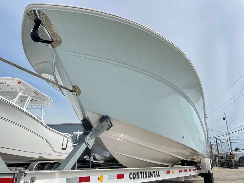 Slide: The Image of 2025 Sea Fox 288 Commander boat on trailer, viewed from below. - 13