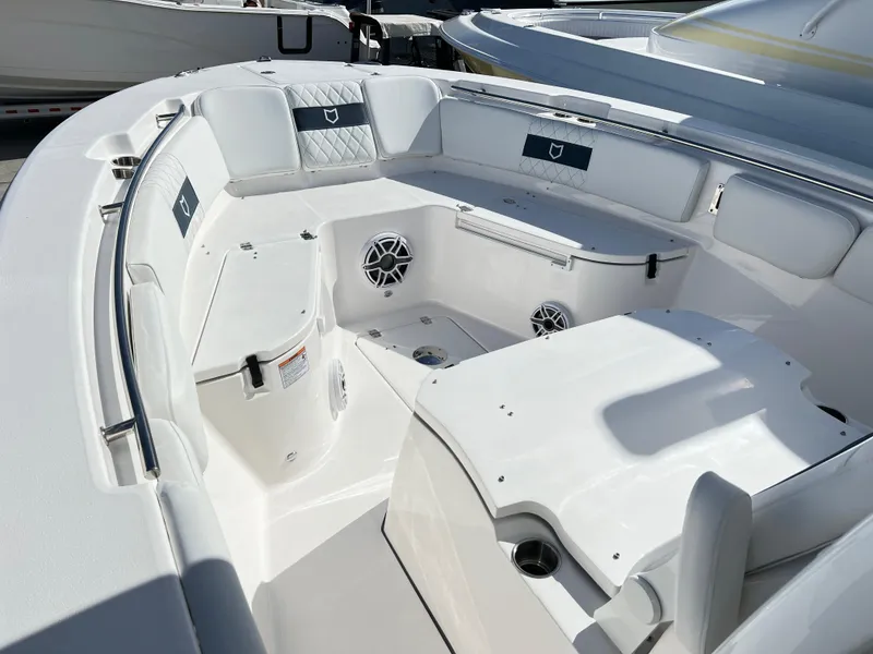 Slide: The Image of 2025 Sea Fox 288 Commander boat interior with white seating and modern design. - 15