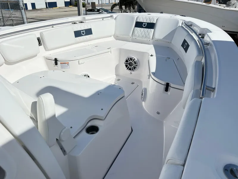 Slide: The Image of 2025 Sea Fox 288 Commander boat interior with white seating and modern design. - 16