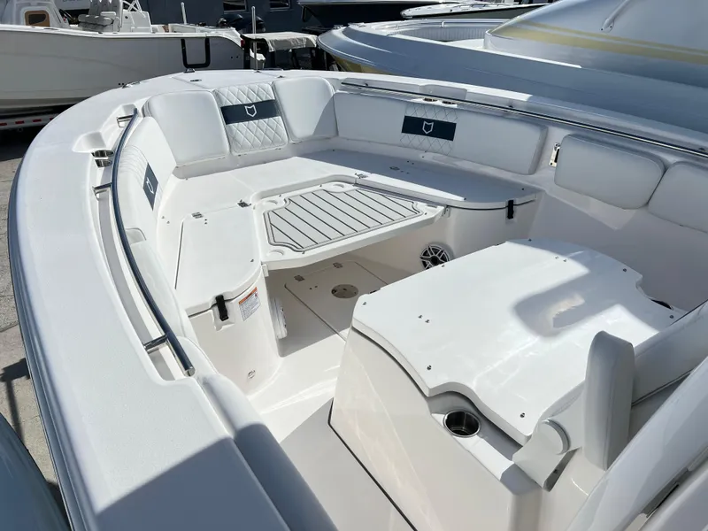 Slide: The Image of 2025 Sea Fox 288 Commander boat interior with seating and table. - 17